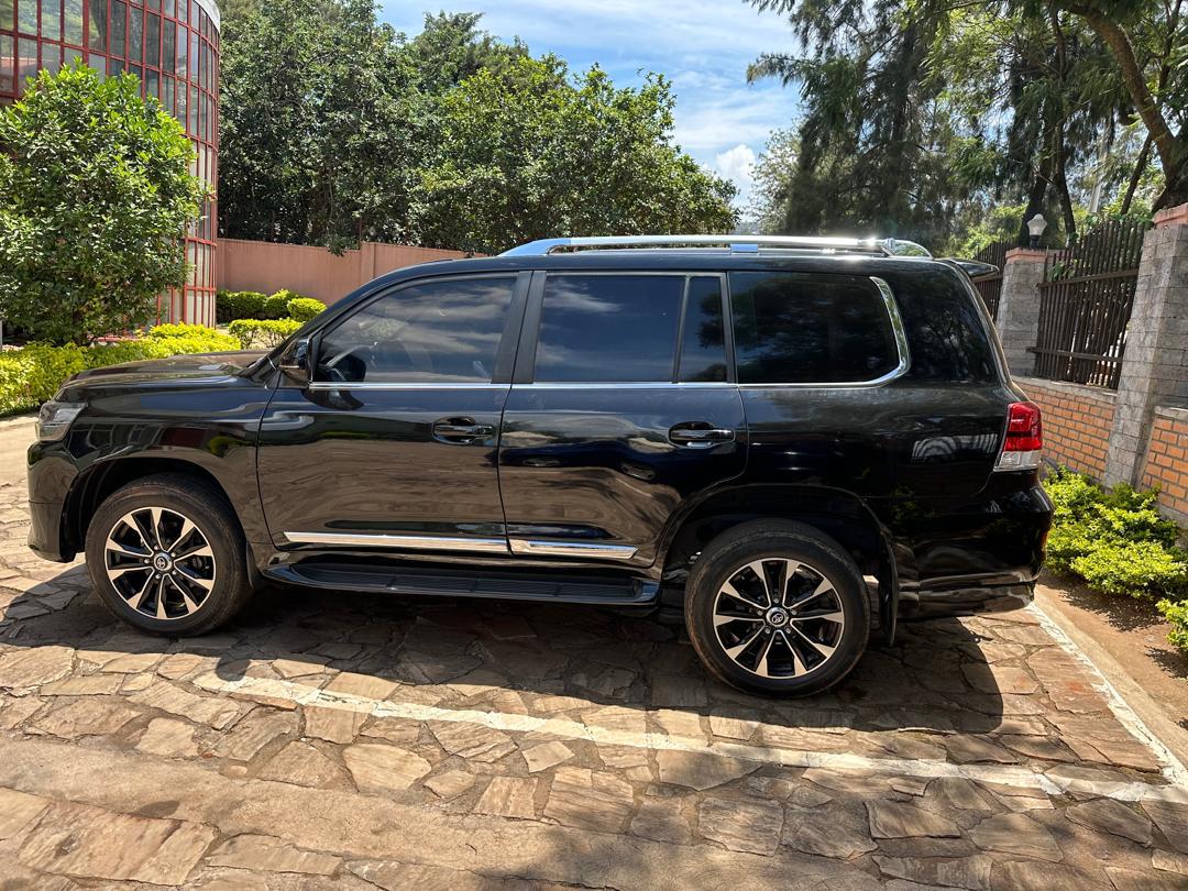 Self-drive Toyota RAV4 on a scenic Rwanda road